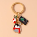 Christmas penguin keychain with enamel socks and Merry X-mas tag on gold metal ring - Penguin And Christmas Sock Style (Elk Socks)