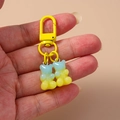 Detail of dual resin gummy bear charms with blue and yellow gradient on a metal clip - Blue Yellow Gradient Style / Yellow-Green