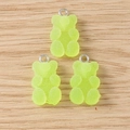 Detailed macro view of three light green resin gummy bear charms with sugar-like matte texture - 20 Pieces Set / Green