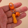 Bell and rose pattern peanut keychain with orange clasp for backpack decoration - Orange-Yellow (I)