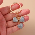 Golden heart keychain with silver glitter charms on metal ring and chain - Silver
