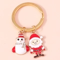 Portachiavi natalizio dorato con ciondoli smaltati di Babbo Natale e pupazzo di neve e strass - Combinazione Pupazzo di Neve Babbo Natale (150)