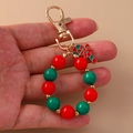 Porte-clés de Noël fait main avec perles rouges vertes et pendentif sucre d'orge - Canne de Bonbon