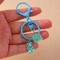 Porte-clés ours en résine bleue avec paillettes et pendentif cube de sucre givré - Ours Sucre Bleu