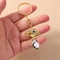 Porte-clés panda doré avec éventail et breloques de fleurs de cerisier roses - Panda Doré