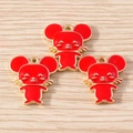 Detailed close-up of three red enamel mouse pendants with gold-plated metal base for DIY - Red (YD1724)