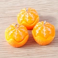 Set of three resin orange fruit pendants with detailed texture and silver metal rings - Peeled Orange Style (YD1615huangse)
