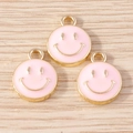 Three pink enamel smiley face charms with gold alloy plating for DIY jewelry making - 10 Pieces Pack / Pink