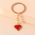 Llavero de corazón rojo con purpurina y cadena dorada para bolsos y accesorios - Corazón de Purpurina / Corazón Rojo