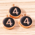 Macro shot of circular number 4 enamel pendants in rose gold for DIY jewelry making - 10 Pieces Pack / Black Number 4 (YD1814heise4)