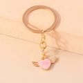 Llavero de corazón rosa con alas de ángel doradas y anillo pulido para mujeres - Corazón con Alas / Corazón Rosa con Alas