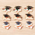 Enamel graduation charms set with mortarboard, diploma and roses on wood background - 10 Pieces Pack / Multicolor