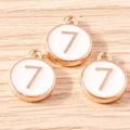 Macro shot of three round number 7 charms with rose gold edges for DIY jewelry - 10 Pieces Pack / White Number 7 (YD1814baise7)