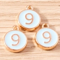 Detail of round number 9 alloy pendants with light blue enamel and rose gold plating - 10 Pieces Pack / Blue Number 9 (YD1814lanse9)