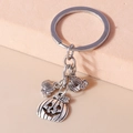 Detail of Halloween keychain featuring three vintage pumpkin pendants on a metal ring - Three Pumpkins Set (YZ700)