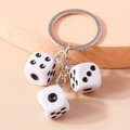 Creative white acrylic dice keychain with three resin pendants and silver metal ring - White