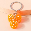 Fun orange acrylic resin dice keychain with silver rings and translucent finish - Orange