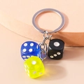 Custom acrylic dice keychain with blue, green and black dice on a silver metal keyring - Black/Yellow/Blue