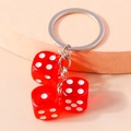 Creative keychain featuring three translucent red acrylic dice with silver metal chain - Red