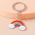 Süßer Regenbogen und Wolken Schlüsselanhänger mit Glitzer und Silberring - Lächelnde Wolke Regenbogen