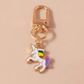 Portachiavi con unicorno dei cartoni animati con criniera arcobaleno e chiusura dorata - Unicorno