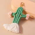 Handmade woven cactus keychain with green cotton rope and colorful tassels on gold clip - Green