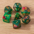 Macro shot of green and magenta polyhedral DND dice with golden numbers and glitter - 7-Pack Set / Pearl Texture Green