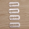 Silver alloy razor blade pendants with 20th anniversary engraving on wood background - Silver