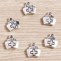 Antique silver alloy nurse hat charms with cross symbol for DIY jewelry making - 20 Pieces Set / Silver