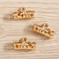 Detailed view of gold-plated hollow alloy tube connectors with floral pattern for jewelry - 10 Pieces Pack / Gold