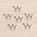 Bulk pack of hollow crown silver alloy charms for DIY jewelry and necklace pendants - Silver