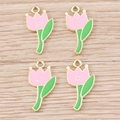 Vista dettagliata di quattro ciondoli a tulipano smaltati con sorrisi su legno - Confezione da 10 / Rosa Rosso