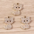 Three gold-plated cartoon cat pendants with sparkling rhinestones for DIY jewelry crafts - Gold
