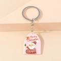 Detail of pink acrylic Santa Claus keychain with Merry Christmas text and silver metal ring - Pink Santa Claus