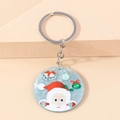 Close-up of Santa Claus and bells pattern on light blue marble texture keychain pendant - Blue Santa Claus