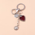 Detail of bohemian heart pendant with eye motif and sun moon charms on metal keychain - Red Evil Eye Sun Moon (YZ210)