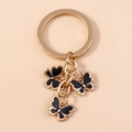 Portachiavi dorato con tre eleganti farfalle in smalto nero dal design a cascata unico - Nero (YZ174heise)