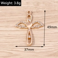 Detail view of gold alloy heart cross pendant with rhinestones on wood background - Gold Heart Wings Cross (YD1486)