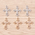 Macro detail of alloy cross pendants with pave-set stones in gold and silver finishes - Mixed Color Cross (YD1488) / 10 Pieces Pack