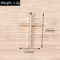 Detailed view of gold cross pendant with cubic zirconia stones showing 29x17mm dimensions - Gold Cross (YD1493)