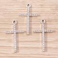 Macro shot of silver plated cross pendants with inlaid rhinestones and top loops - Silver Cross (YD1493)