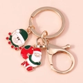 Portachiavi natalizio con ciondoli Babbo Natale e renna in lega con finitura dorata - Babbo Natale E Renna Ciondolo (YZ142)