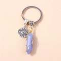 Handmade evil eye keychain with light blue hexagonal stone and gold wire wrap - Blue Evil Eye Pillar (YZ194zise)