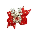 Close-up of a festive red bow hair clip featuring a glittery reindeer and gold sequins - Gold Sequin Reindeer Head (MC956)