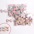 Floral print bow hair clips set for babies featuring pink and purple ribbon designs - 40Pcs Pack / Purple And Pink Pattern (MS2271)