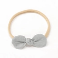 Soft cotton linen baby bow headband in light grey with a nude seamless elastic nylon strap - Light Gray