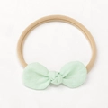 Linen mint green bow headband for newborns with seamless elastic nylon band - Pale Green