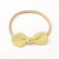 Bandeau bébé avec nœud en lin jaune pâle et bande en nylon élastique douce sans couture - Jaune Céleri