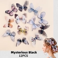 Lot de 12 barrettes papillon noires avec ailes en tulle délicat et petits strass brillants - Papillons Série Noir Et Blanc (MS6721)