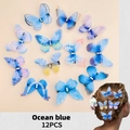 Lot de 12 barrettes papillon en tulle bleu océan avec centre en strass brillant - Papillons Série Bleu (MS6724)